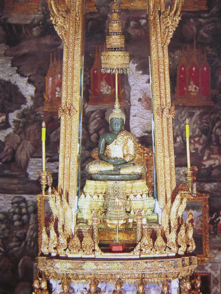 Bangkok 04 06 Wat Phra Kaeo Temple of the Emerald Photo of Emerald Buddha The Emerald Buddha is a rather small 0.6m (2 ft.), dark statue, carved from a block of green jade. It is enshrined on a golden traditional Thai-style throne made of gilded-carved wood. It was first discovered in 1434, and was covered with plaster. The abbot who found it noticed the nose had flaked off, and then discovered the jade underneath.
